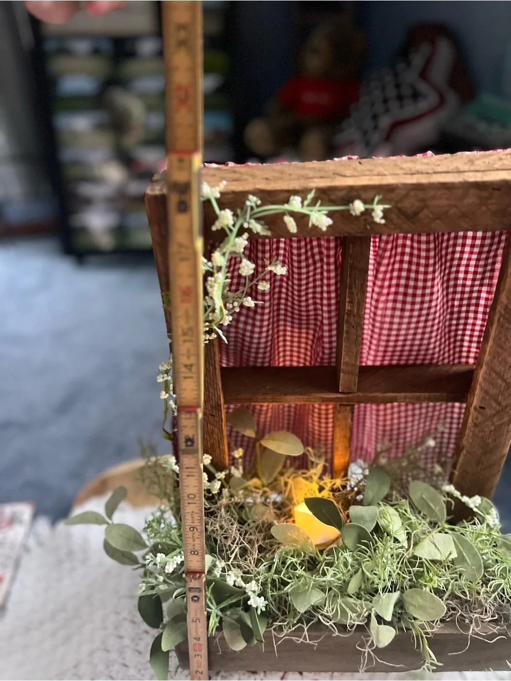 Rustic Windowbox Accent with Greenery and Soft Candle Light